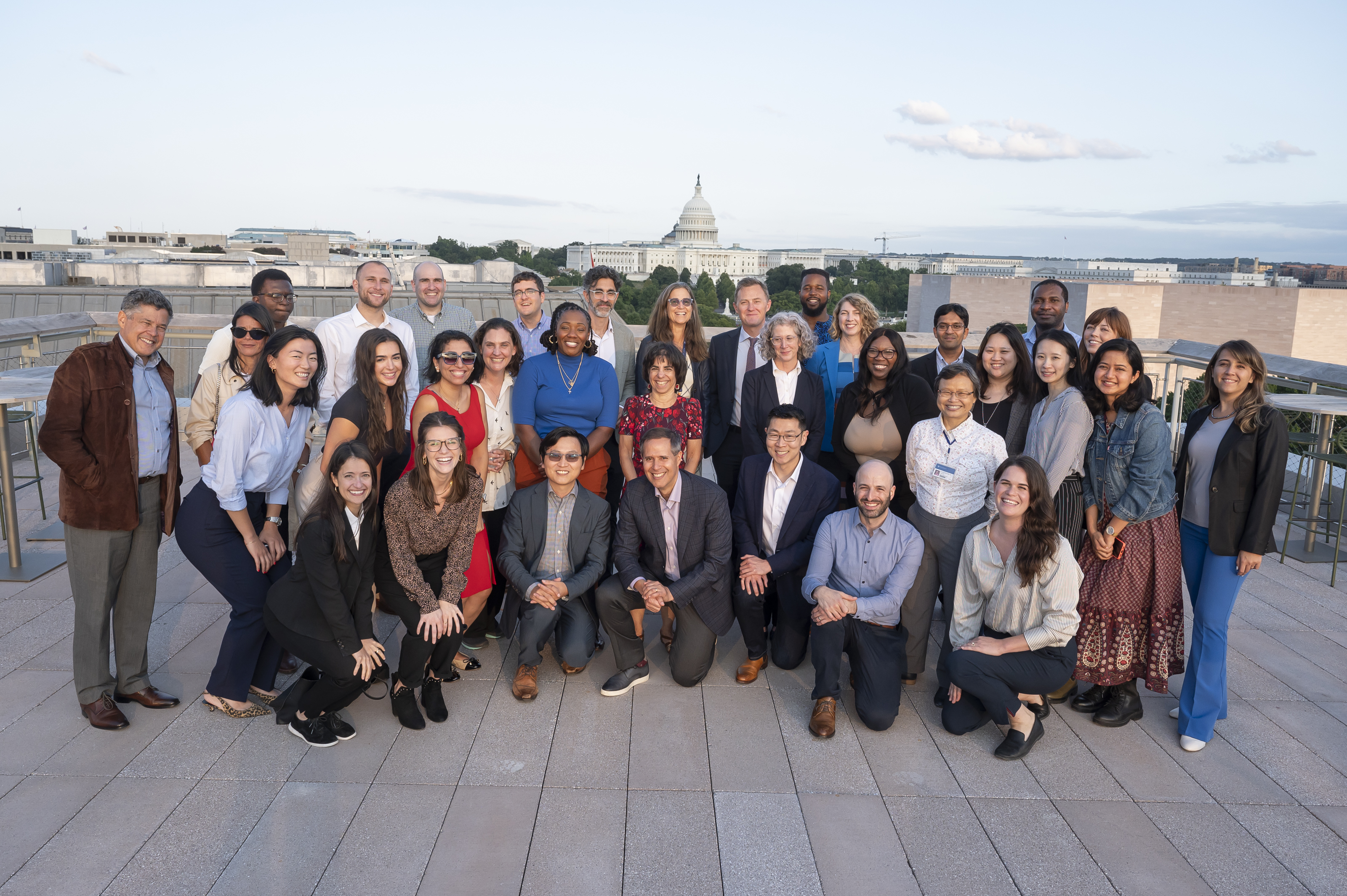 A handful of HBHI members gathered on the rooftop before a team dinner