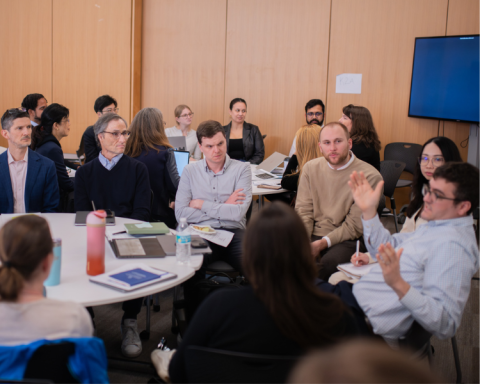 Breakout group 2 around table during HBHI retreat